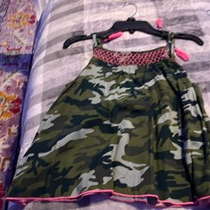 I’m selling a camo tank top that would probably be worn in summer time!